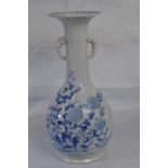 Oriental blue and white vase with a pair of elephant decoration handles. (marks to base). H25cm