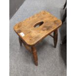 Elm four legged stool, F. East & co. Ltd. 1936, 38cm x 28cm H37cm.