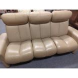 Ekornes Stressless Cream leather reclining three seater sofa.