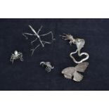 Six intricately detailed white metal creatures including; moth, spider, stick insect, crab, cobra an