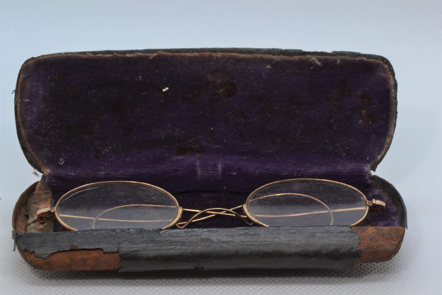 Pair of 9ct gold framed spectacles, gross weight 10.5 grams, with case 