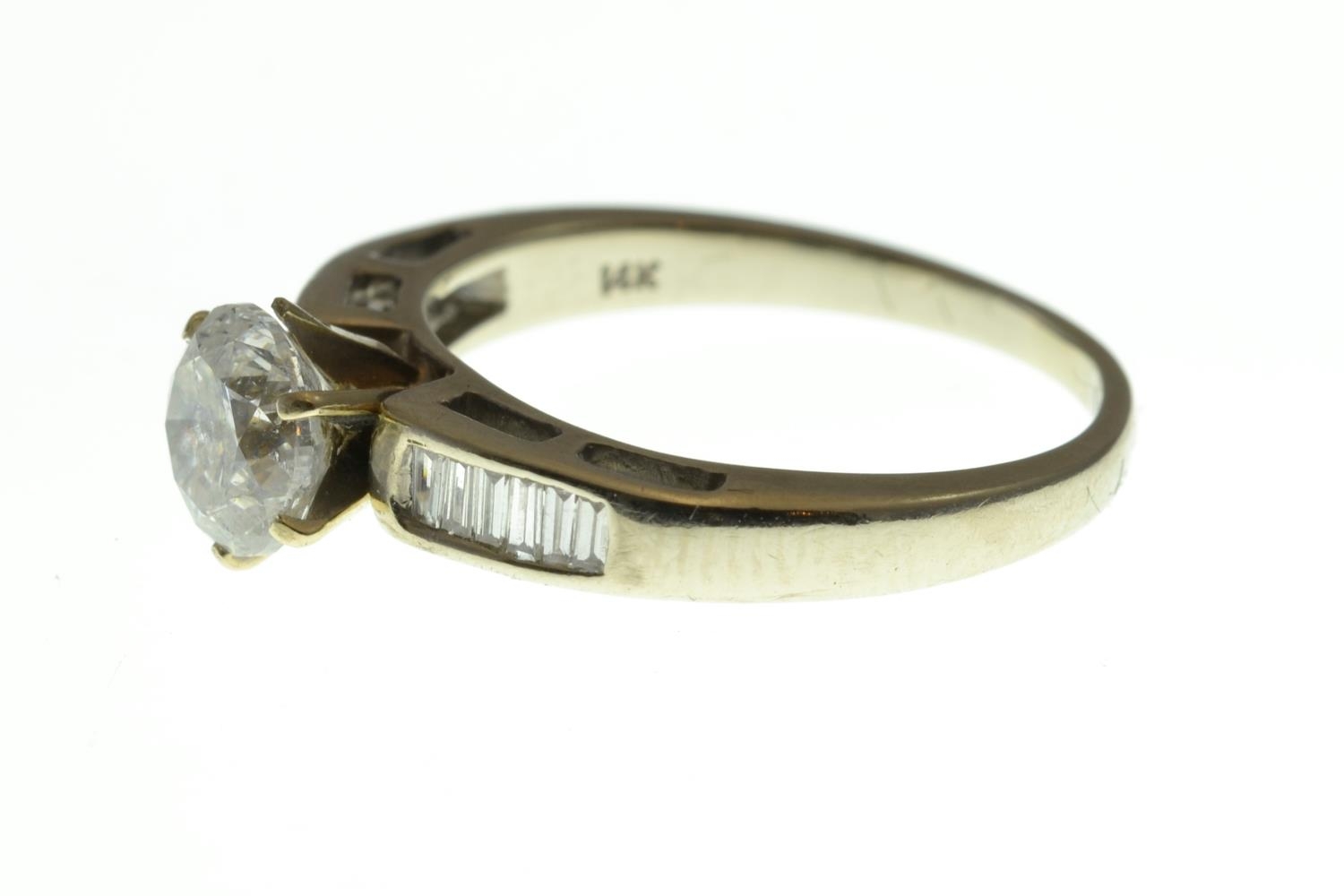 14ct white gold & diamond ring, the approx. 0.80 carat brilliant-cut diamond claw-set between baguet - Image 2 of 4