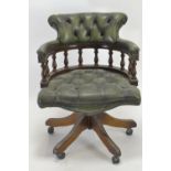 Button backed green leather chesterfield style captains chair