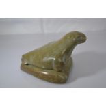 Canadian Eskimo Art green stone Inuit carving of a walrus on a rock, length 13.5cm x height 8.5cm