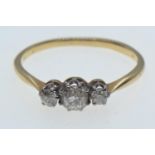 Gold & three stone diamond ring, marks rubbed but tests positive for 18ct gold, size O1/2, 1.86 gram