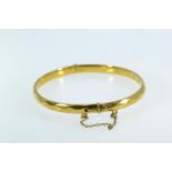 9ct gold metal cored hinged bracelet, inner width 59mm, gross weight 13.3 grams
