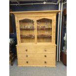 Stripped pine dresser, Glass fronted with two over two Drawers H191cm W158.5cm D48.5cm