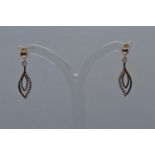 Pair of 9ct rose gold & white stone pendant earrings, length 25mm, gross weight 1.27 grams