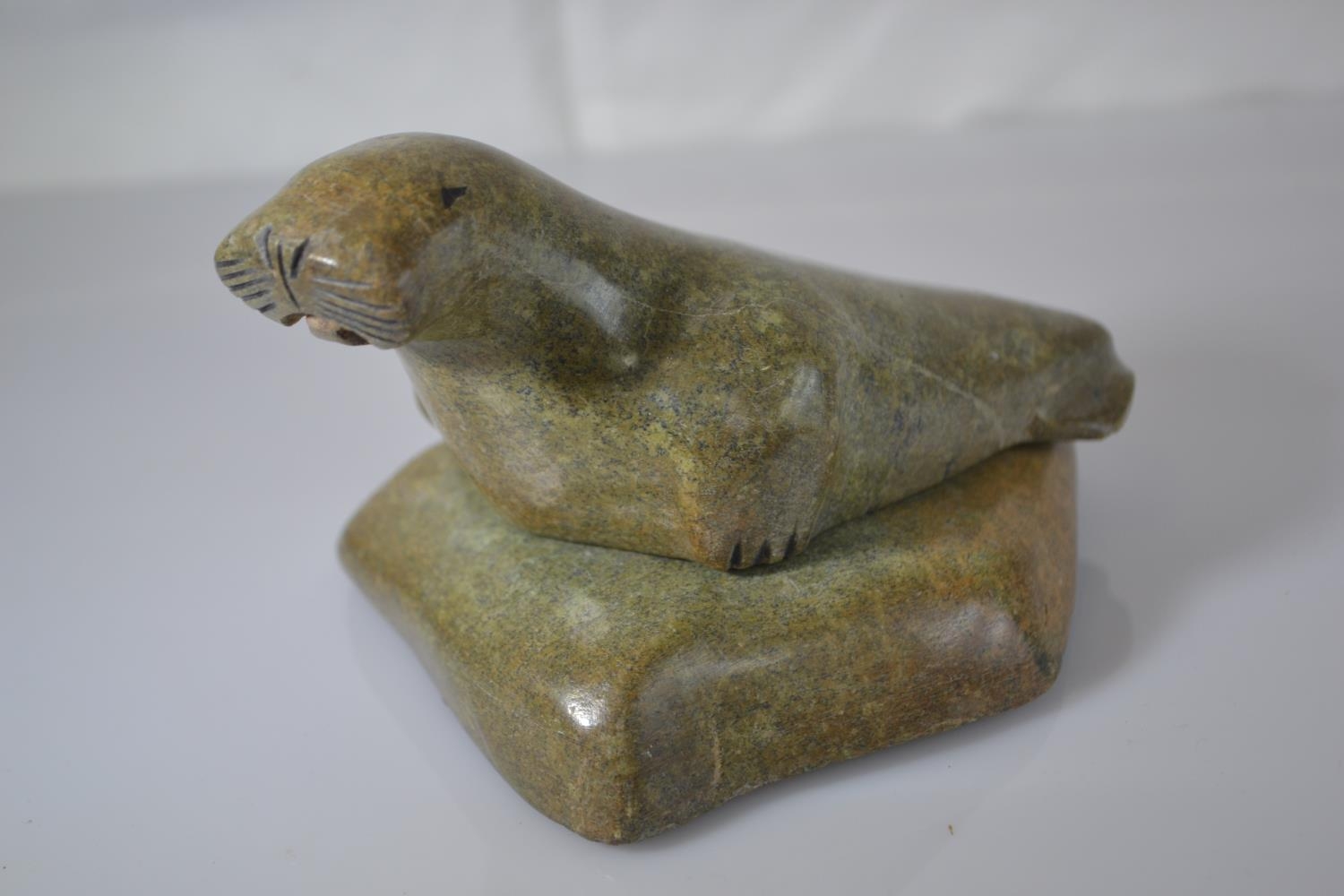 Canadian Eskimo Art green stone Inuit carving of a walrus on a rock, length 13.5cm x height 8.5cm  - Image 3 of 4