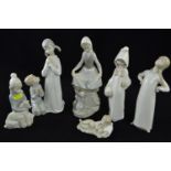 Six Lladro figures inc. two children in nightgowns, shepherd girl, girl with lamb, girl with rabbit