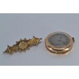 9ct gold cased ladies watch & 9ct gold brooch with non gold pin