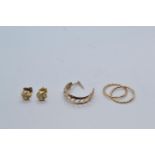 Two pairs of yellow metal earrings & a single earrings, tested positive for 9ct gold, gross weight 1