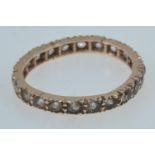 Yellow metal & white stone eternity ring, tests positive for 9ct gold, size N1/2, 1.79 grams