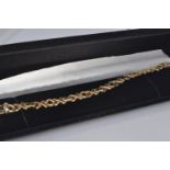 9ct gold fancy link bracelet, 180mm length, 9 grams