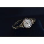 9ct rose gold cased Helvetia watch with subsidiary seconds, case diameter 22mm, on a rolled gold bra