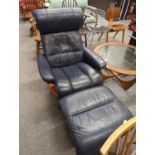 Navy blue leather 'Stressless' recliner with footstool