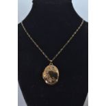 9ct gold locket on chain, gross weight 3 grams
