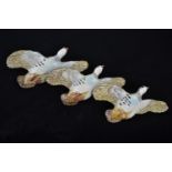 Three graduated Beswick flying partridges, model 1188, printed and impressed marks, largest with a w