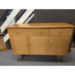 Ercol Model 351 sideboard in beech and elm in a natural finish; 123 x 45.5 x ht82cms