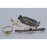 Three 9ct gold items, comprising: signet ring, size I1/2; cross pendant & a red stone set brooch, wi