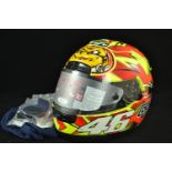 Valentino Rossi signed AGV crash helmet. With paperwork, box and helmet bag