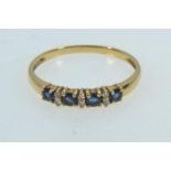 Yellow metal, sapphire & diamond half hoop ring, hallmarks rubbed but tests positive for 18ct gold,