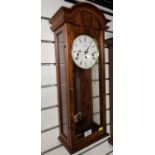 Wood cased wallclock by Comitti, London; with glazed front & sides, pendulum & key present