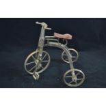 Vintage tricycle model 25cm high. With moving parts