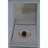 22ct gold ring with early Victorian hallmark, bezel-set with a red stone, size P, gross weight 2.1 g
