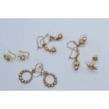 Four pairs of 9ct gold earrings, including one stone set, & a single 9ct gold ear stud, gross weight