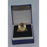 9ct gold ring claw set with pale citrine coloured stone, size O/P, gross weight 5.5 grams