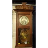 Arts and crafts oak cased wall clock with glazed front, key & pendulum present, clack face diameter