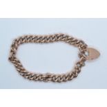 9ct rose gold curb link bracelet with heart-shaped padlock clasp, each link stamped '9c', 15.84 gram