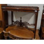 Galleried side table with ornate fretwork stretchers, 85 x 47cms x ht72cms to top of gallery