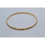 22ct gold bangle, inner diameter 64mm, 10.71 grams