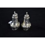 Pair of late Victorian silver pepperettes, maker William Aitken, Chester 1899, height 8cm, gross wei