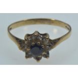 9ct gold, sapphire & white stone flowerhead cluster ring, size P1/2, 1.68 grams