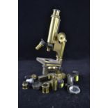 Brass microscope by R & J Beck Ltd, London; ht 32cms, with extra lenses & mirror