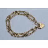 9ct gold gate link bracelet with heart-shaped padlock clasp, 12.2 grams