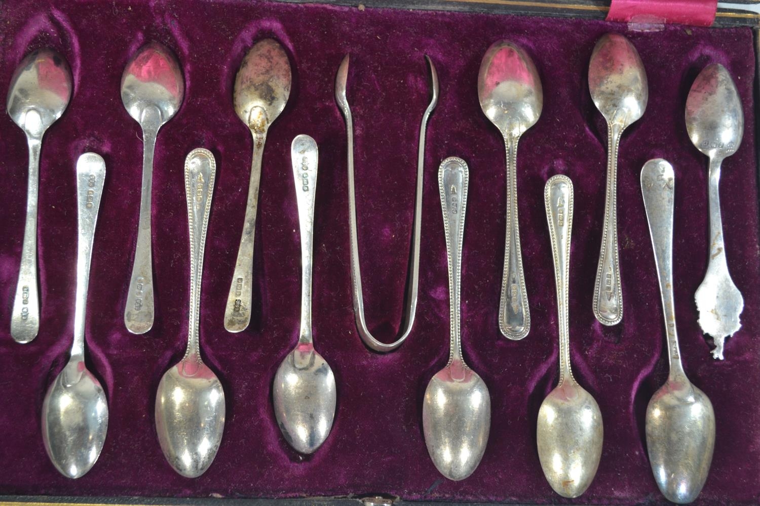 Cased matched part set of ten coffee spoons & a pair of sugar nips, makers Walker & Hall and W S Sav - Image 3 of 4