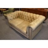 Pale green Chesterfield style sofa. 159cm wide x 90cm deep x 67cm high