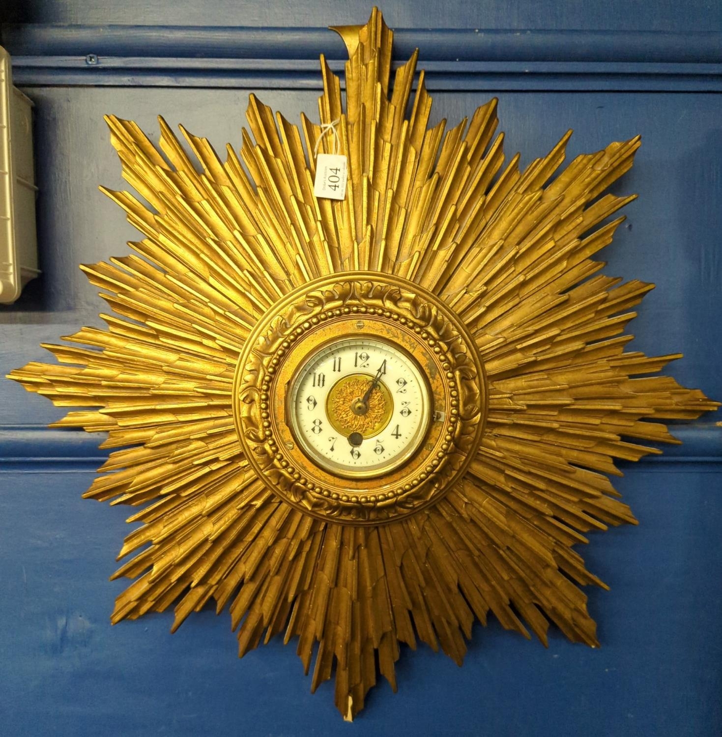 Early C20th plaster sunburst wall clock, original movement has been converted to quartz, depth 12cm 