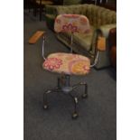 Vintage HAG industrial chair, re covered in a floral fabric