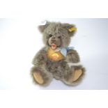 Steiff Zotty bear, with ear tag & labels, length 32cm