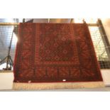 Belgian woollen rug in red, blue and black tones, 140 x 200cm