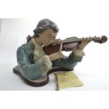 Lladro violin player 'Concertino', by Vicente Martinez & Julio Ruiz, model no. 2063 ltd. ed. 307 of