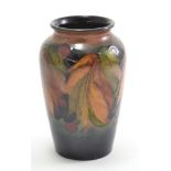 William Moorcroft flambé glazed 'Leaf & Berry' pattern vase, circa 1930, signed & impressed marks, h