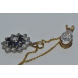 Yellow metal, sapphire & white stone cluster pendant & a 9ct gold white stone teardrop pendant, with