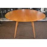 Blonde Ercol drop leaf table, unextended 63x110cm, extended 125cm