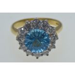 18ct gold, blue topaz & diamond cluster ring, size N, 6.63 grams